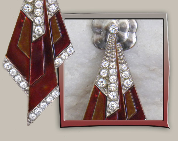 Unique enamel vintage brooch with red enamel and rhinestones forming a tie shape