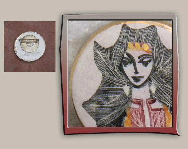 button brooch has etching style drawing of power figure princess or goddess.