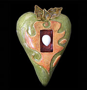 green heart with egg in niche
