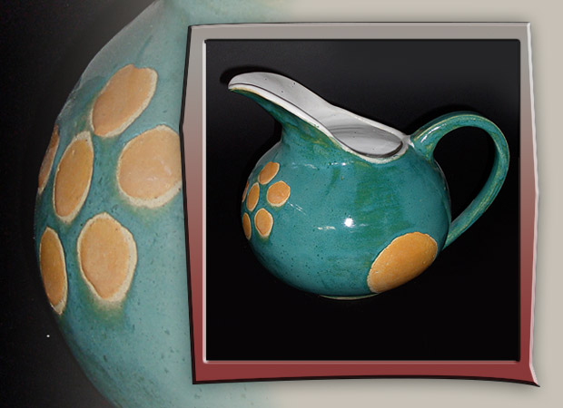 large ceramic teal pitcher