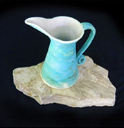 stoneware pitcher in matte turquoise glaze