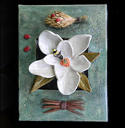 magnolia tree flower and seed pod in clay plaque
