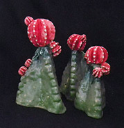 stoneware cactus sculpture with red flowers