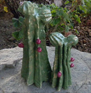 pair of stoneware cacti with purple flower buds