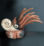 fossil -like sculpture of chambered nautilus