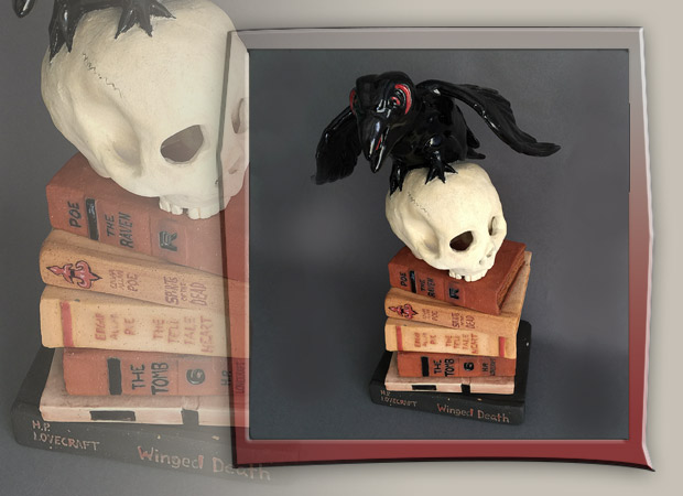 raven with skull and books in clay 