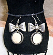 silver and white bow earrings