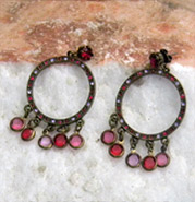 Stud earring hoops of ping, red and orange crystals and glass beads.
