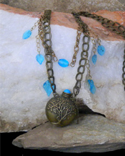 handmade designer necklace with chunky chain and tree vial pendant