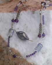 designer beaded necklace with purple and clear glass beads