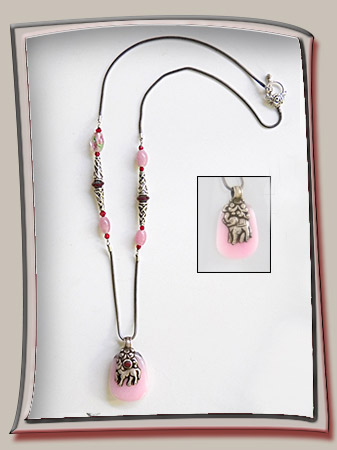 pink quartz tibetan pendant>
<img src=