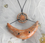 whistle pendant necklace made from raku fired clay