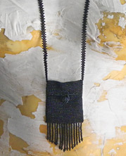 necklace with tiny black bead woven bag with beaded button clasp