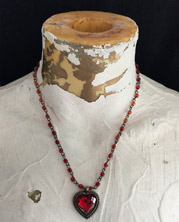 starter necklace has a red Lucite heart